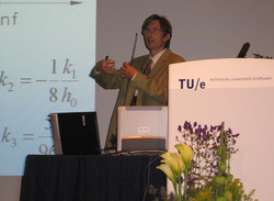 Gabor Stepan discusses Delay, Parametric Excitation and the Nonlinear Dynamics of Cutting; photograph by Gabor Orosz